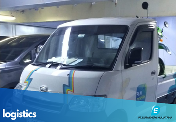 Telecommunications tower with a cityscape background