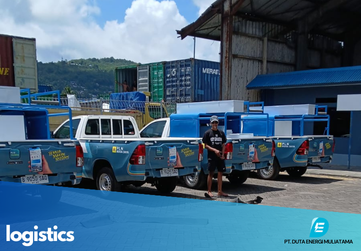 Telecommunications tower with a cloudy sky background